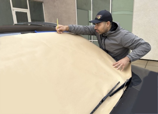 Patterning our custom-made windshield sun shades for every model car.