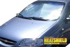 Heatshield Windshield Sun Shade for 2004, 2005, 2006 Chevrolet Aveo (exterior view)