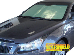Heatshield Windshield Sun Shade for 2007, 2008, 2009, 2010, 2011 Chevrolet Aveo (exterior view)
