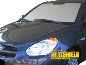 Heatshield Windshield Sun Shade for 2006, 2007, 2008, 2009, 2010, 2011 Hyundai Accent (exterior view)