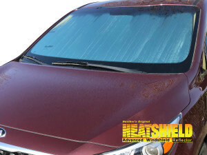 Heatshield Windshield Sun Shade for 2014-2021 Kia Sedona (exterior view)