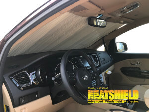 Heatshield Windshield Sun Shade for 2014 Kia Sedona (interior view)